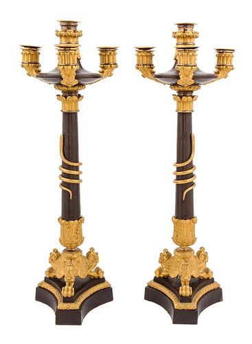 A Pair of Charles X Gilt and Patinated Bronze Four-Light Candelabra Height 31 inches.