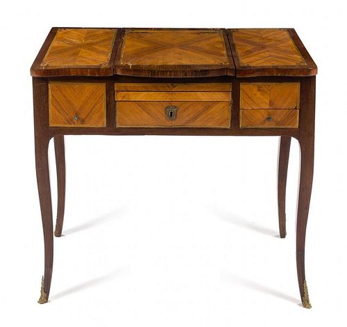 A Louis XV Style Fruitwood Poudreuse Height 28 x width 31 x depth 17 3/4 inches.