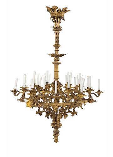 A Gothic Revival Gilt Bronze Thirty-Light Chandelier Height 60 x diameter 39 inches.
