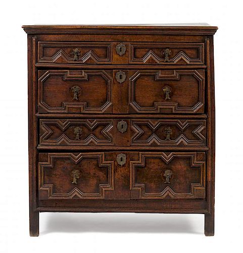 A Charles II Oak Chest of Drawers Height 39 1/2 x width 36 1/2 x depth 20 1/2 inches.