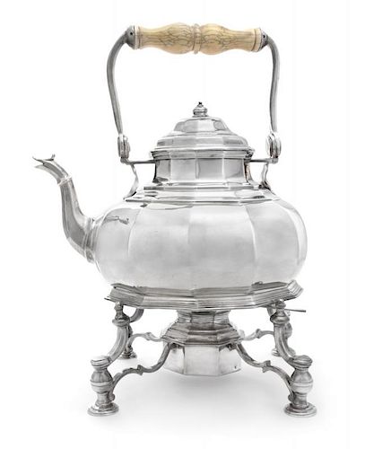 A Queen Anne Silver Kettle on Lampstand, Augustine Courtauld, London, 1713, of squat form with a swivel handle surmounting a