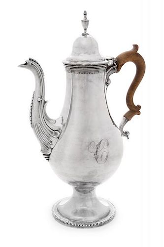 An American Silver Coffee Pot, William Ball, Baltimore, Circa 1795, the domed lid having an urn form finial and a beaded rim,