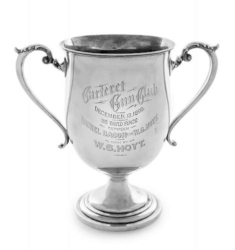 An American Silver Trophy, Black, Starr & Frost, New York, NY, the twin handles capped with foliate scrolls, bearing the engr