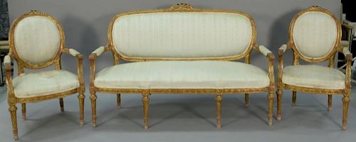 Louis XVI three piece suite to include canape with gilt frame and pair of fauteuil. ht. 40in., wd. 64in. Provenance: Collecti