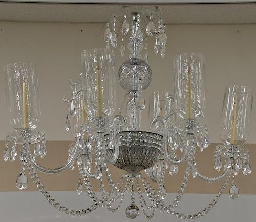 Cut colorless chandelier with six arms having hurricane shades. ht. without chain: 48in., dia. approximately 48 in. Provenanc