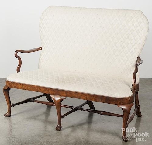 George II walnut settee, ca. 1760, with a slip seat, serpentine arms, and slipper feet, 43'' h., 53''