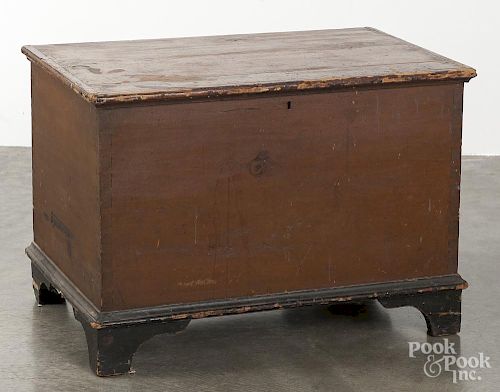 Small painted pine blanket chest, 19th c., retaining an old orange surface, 21'' h., 31'' w.