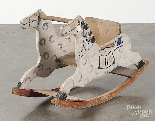 Painted child's rocking horse, ca. 1930, 21'' h., 34'' w.