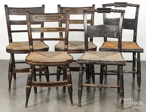 Seven painted rush seat chairs, 19th c., together with a rocker.