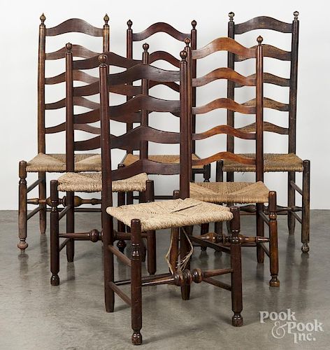 Assembled set of nine Delaware Valley ladderback chairs, 18th/19th c., to include two armchairs and