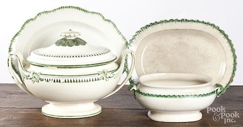 Two pearlware green feather edge platters, 19th c., together with a similar tureen and a larger ture