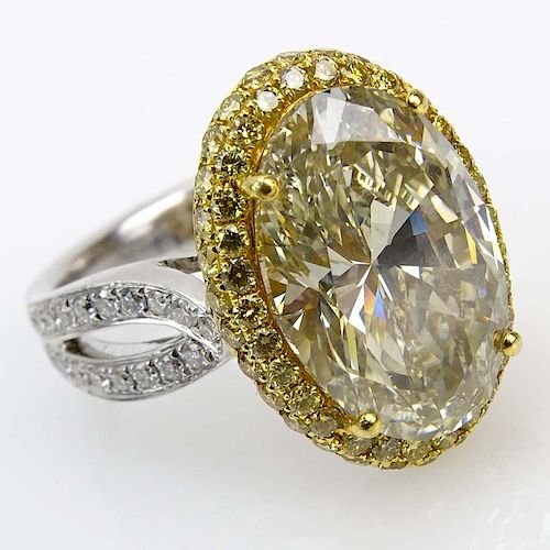 GIA Certified 7.04 Carat Oval Brilliant Cut Fancy Gray-Greenish Yellow Diamond and 18 Karat Yellow and White Gold Engagement 