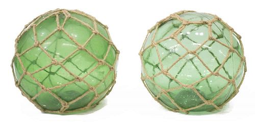 (2) NETTED BLOWN GREEN GLASS FISHING FLOATS