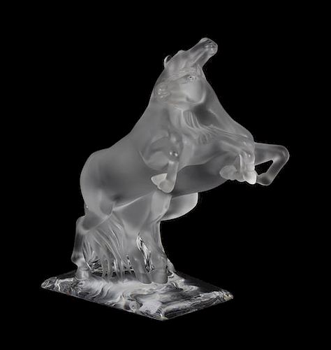 A Lalique Molded and Frosted Glass Figural Group, Height 14 1/4 inches.