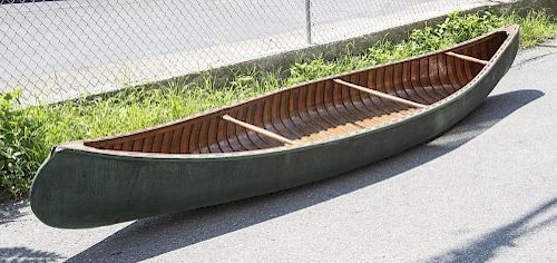 'OLD TOWN' WOOD AND CANVAS CANOE, RETAILED BY KENNEDY BROTHERS ARMS COMPANY, ST. PAUL, MINN. 1911