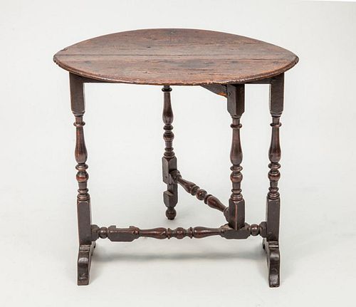 CONTINENTAL STAINED OAK FLIP-TOP GATE-LEG TABLE