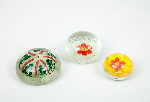 TWO GLASS FLORAL PAPERWEIGHTS AND ANOTHER GLASS PAPERWEIGHT