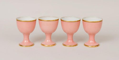 SET OF FOUR FITZ AND FLOYD SALMON-GLAZED GOBLETS, IN THE 'RENAISSANCE' PATTERN