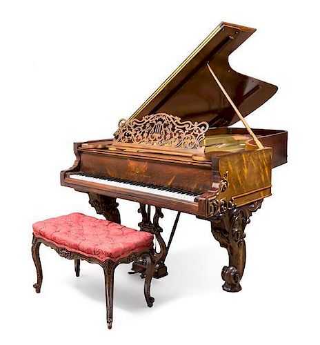 A Steinway & Sons Rosewood Concert Grand Piano Length overall approximately 100 inches.