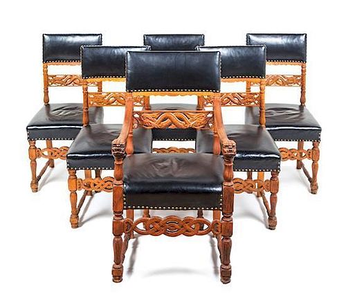 A Set of Six American Carved Oak Chairs Height of tallest 41 inches.