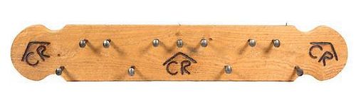 An Original Rustic Wood and Railroad Spike Coat Rack Height 12 x width 72 x depth 18 inches.