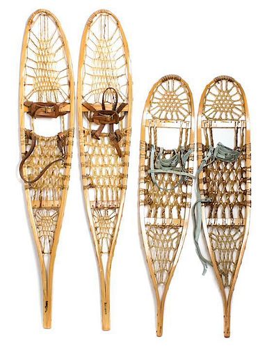 Three Pairs of Vintage Snow Shoes. Length of longest pair 56 inches.