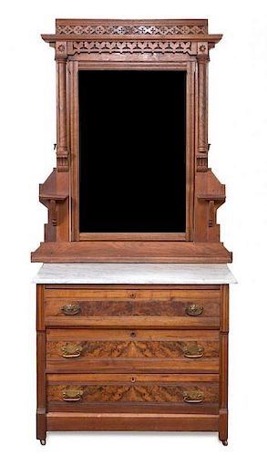 A Victorian Walnut and Mahogany Washstand Height 85 inches.