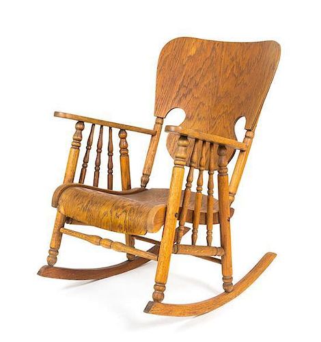 An American Oak Rocking Chair Height 35 inches.