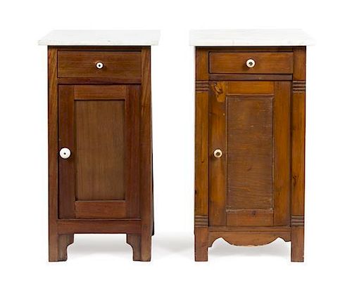 A Near Pair of American Oak Bedside Cabinets Height 28 1/2 x width 16 1/2 x depth 15 1/2 inches.