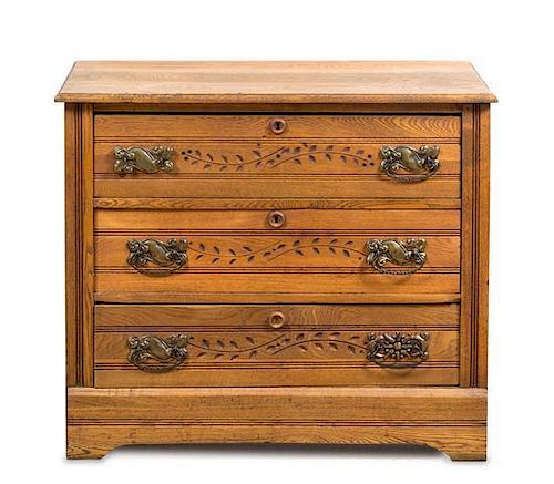 An American Oak Chest of Drawers Height 30 x width 35 x depth 17 inches.