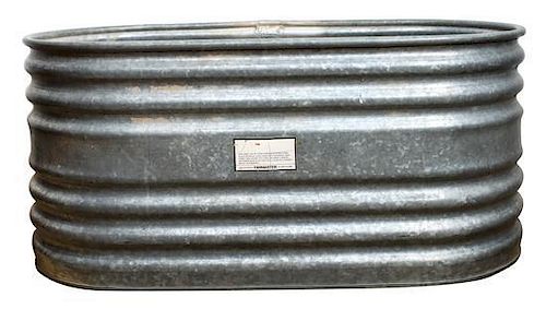 A Farmaster Stock Tank Height 24 x width 51 1/4 inches.