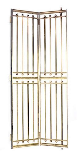 A Pair of Brass Elevator Gates from the Caribou Ranch Recording Studio Height 82 x width 34 inches (open).