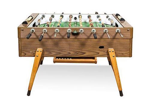 A Foosball Table from the Caribou Ranch Recording Studio Height 35 x width 29 x depth 55 inches.