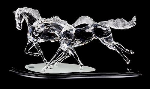 A Swarovski Cut Glass Figural Group, Width 13 inches.