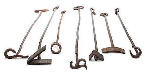 Seven Branding Irons. Length of longest 48 1/2 inches.