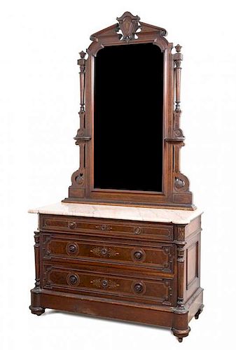 An Eastlake Style Mahogany Dresser Height 92 x width 48 1/2 x depth 22 1/2 inches.