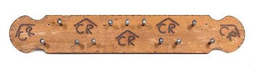 An Original Wood and Railroad Spike Coat Rack Length 71 3/4 inches.