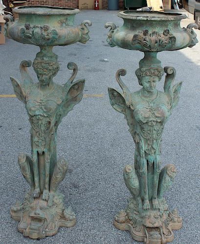 A Pair of Impressive Life Size Patinated Bronze
