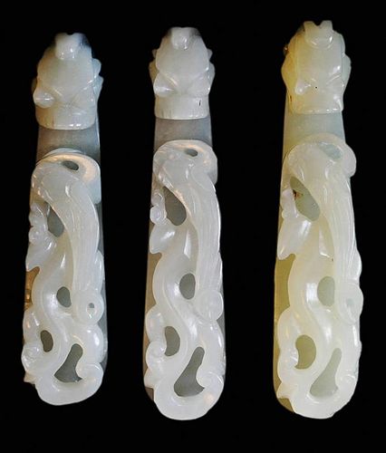 Three Finely Carved Jade Dragon-