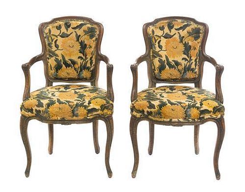 A Pair of Louis XV Style Fruitwood Fauteuils, Height 35 1/2 inches.