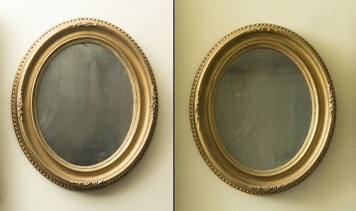 PAIR OF VICTORIAN CARVED GILT-GESSO-ON-WOOD OVAL MIRRORS