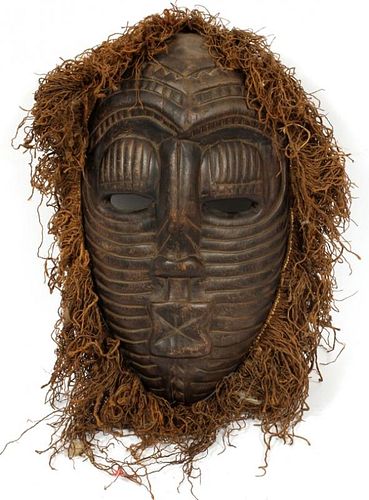ZAIRE CARVED WOOD AND RAFFIA MASK OF FEMALE