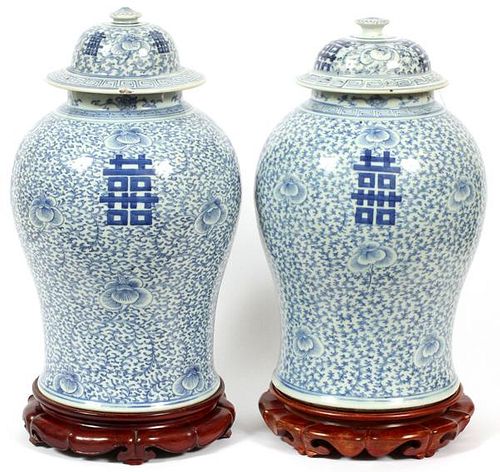 CHINESE BLUE AND WHITE TEMPLE JARS PAIR