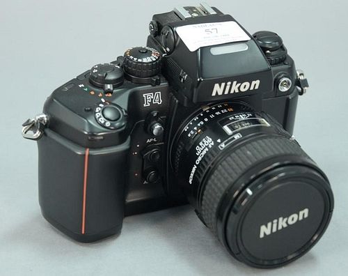 Nikon F4 (2459335) with AF Micro Nikkor 60/2.8D and MF-22 back.