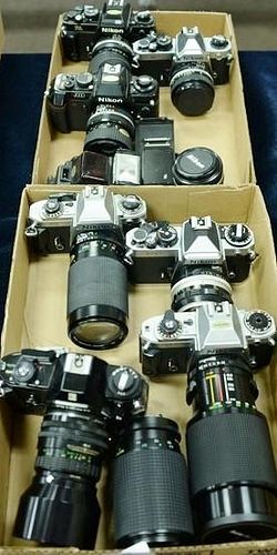 Two box lots: Lot of Nikon Manual Focus A including Nikon EM with Sigma 28-80, MD-E drive with 50/1.8 Series E,, extension (F