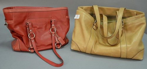 Two Coach full sized leather handbags.