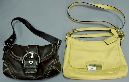 Two Coach leather handbags.