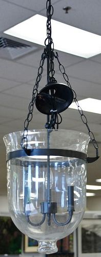 Set of three contemporary hanging light fixtures, each having three lights. ht. 38in.