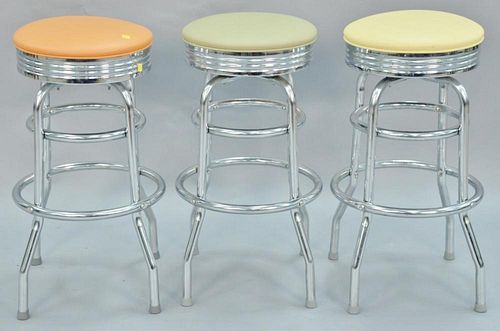 Three chrome stools with leather tops. ht. 30in.