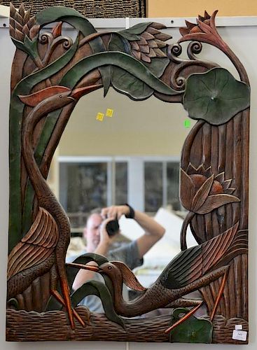 Art Nouveau style mirror with carved lyly and cranes, mid to late 20th century. 37" x 27"